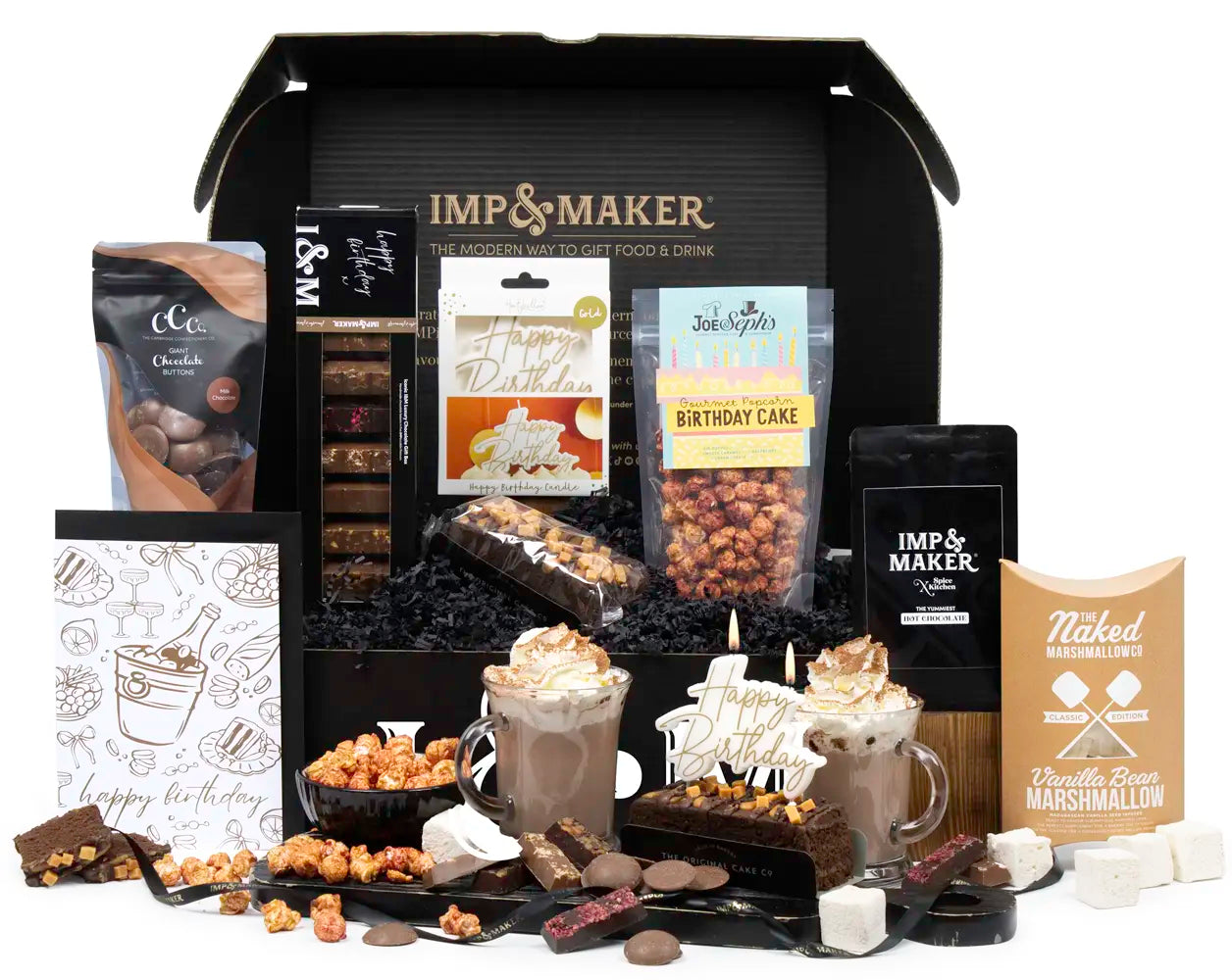 Gourmet gift set with hot chocolate and snacks, featuring Imp & Maker branding.