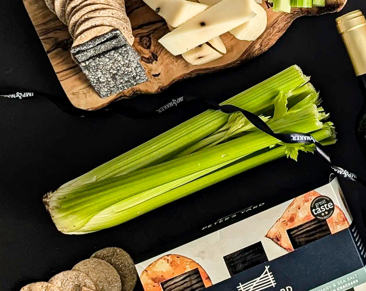 Fresh bunch of celery on dark background