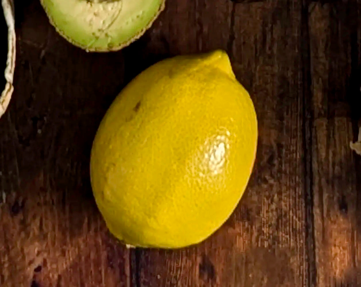 Fresh Lemon on wooden background