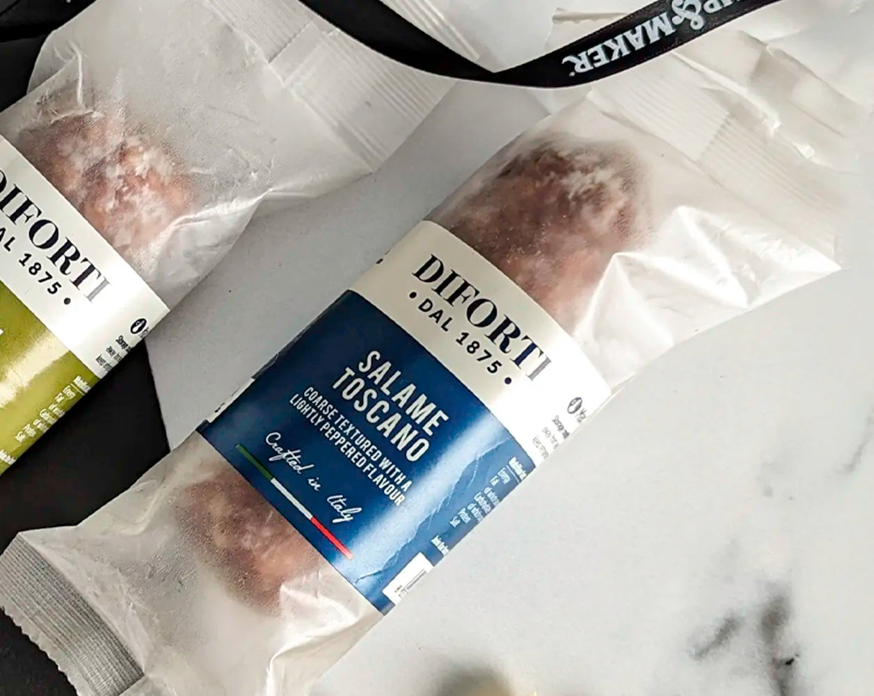 Diforti Salame Toscano oin marble background