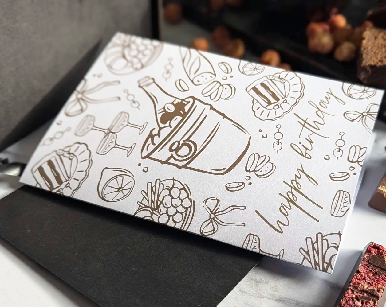 Greeting card with birthday design and black envelope