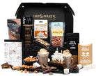 Gourmet gift set with hot chocolate and snacks, featuring Imp & Maker branding.