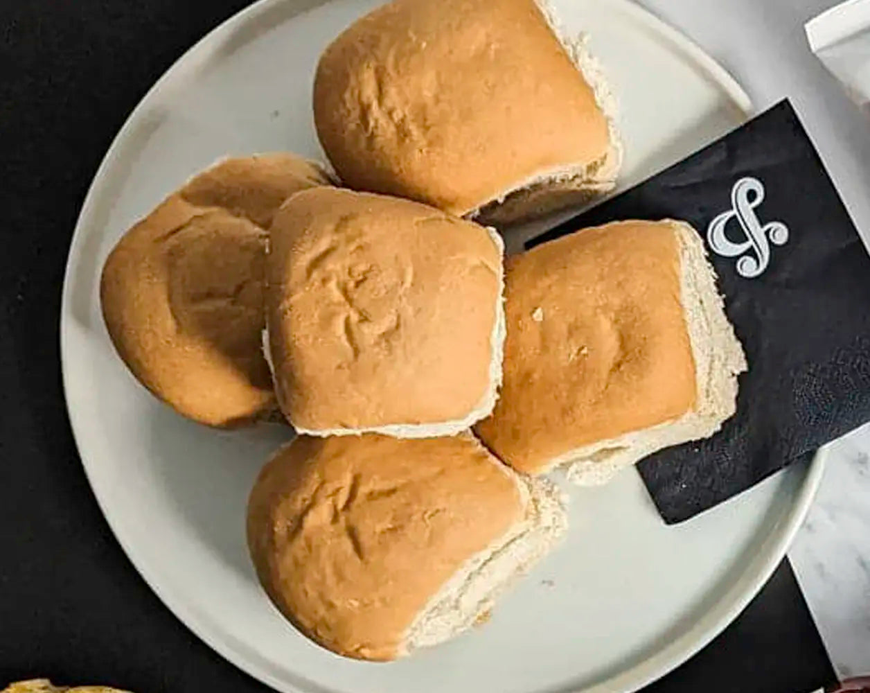 Bread Rolls 6 Pack on a plate and napkin
