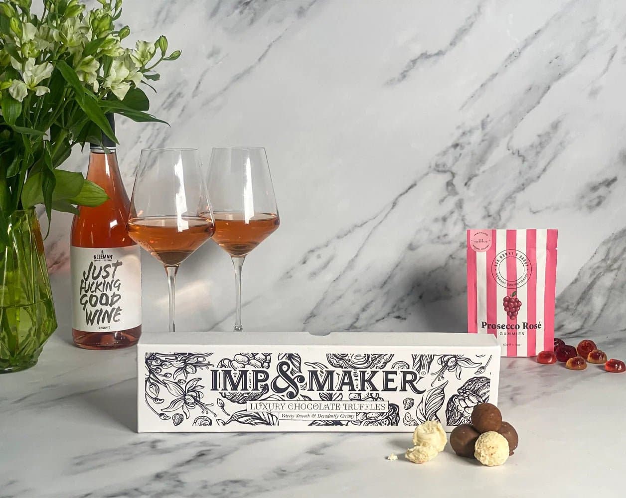 https://impandmaker.co.uk/cdn/shop/products/rose-wine-sweet-treats-hamper-314885.webp?v=1694524838